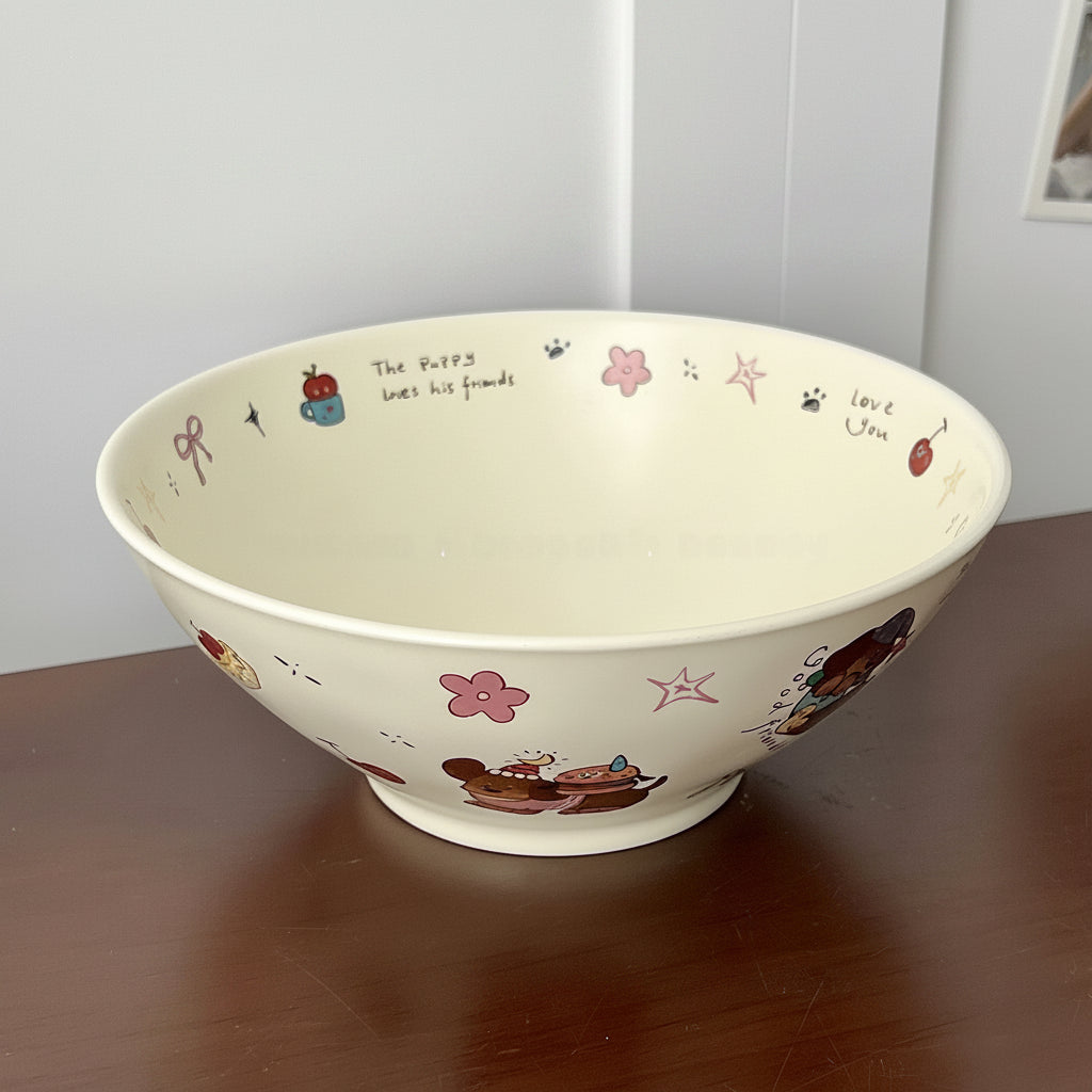 Decorative ceramic kawaii ramen bowl with cartoon designs on a wooden surface