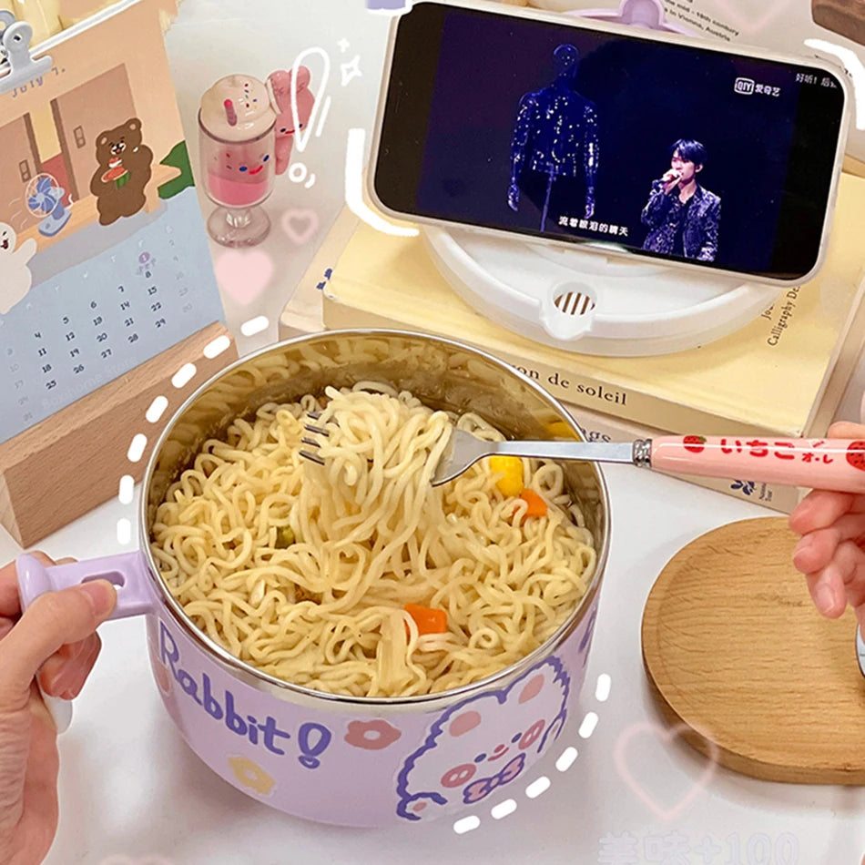 Someone eating noodles from a purple rabbit themed kawaii ramen bowl
