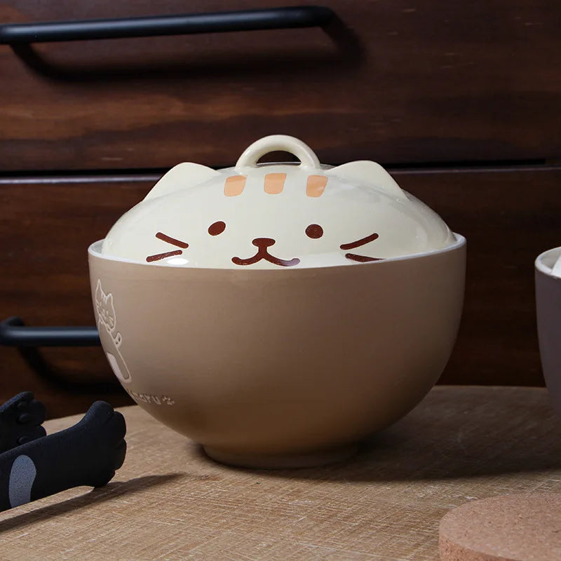 Cat-shaped ceramic kawaii ramen bowl on a wooden surface