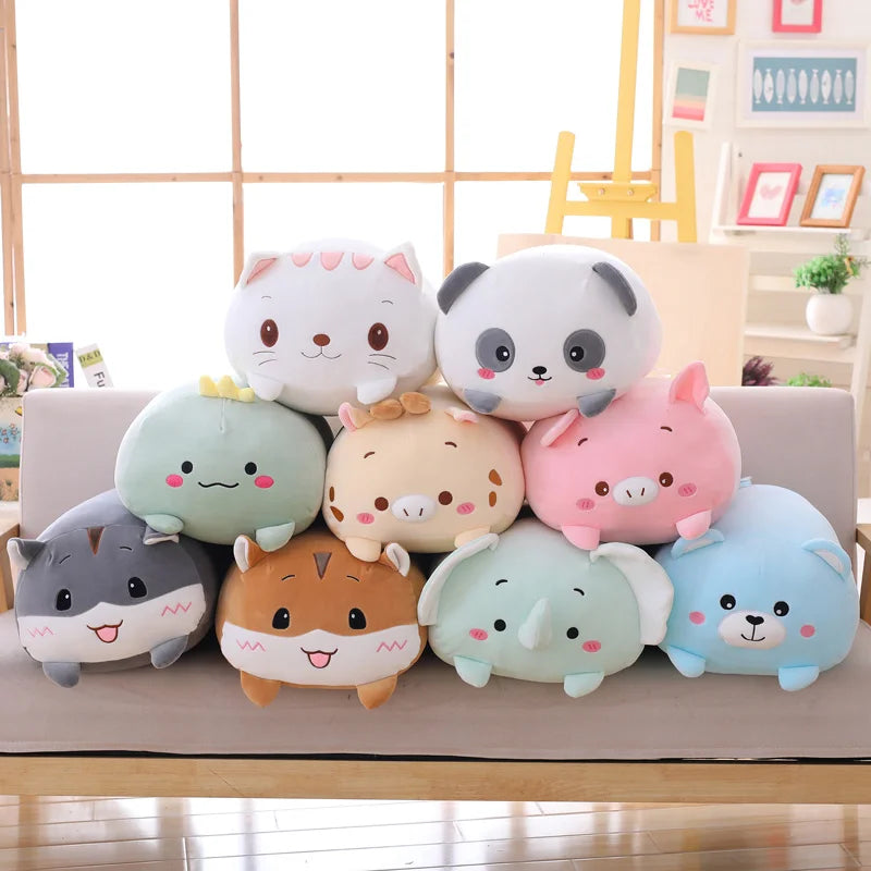 Set of cute kawaii animal plush toys on a couch in a room with decor elements.