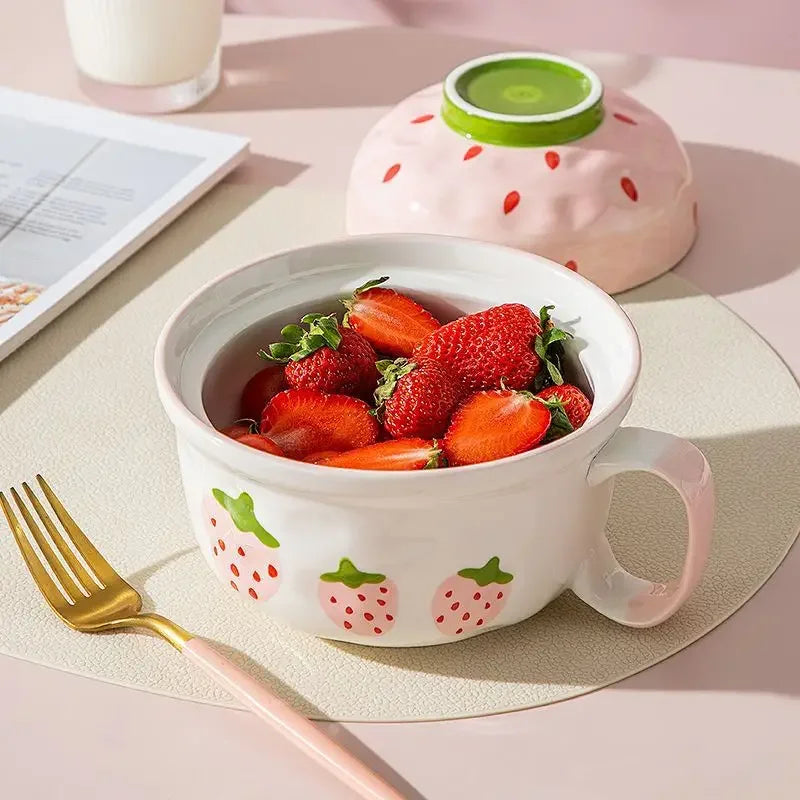 A strawberry designed kawaii bowl with strawberries in it