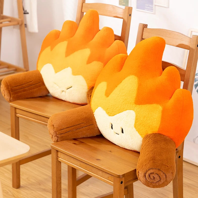Two fire and log kawaii plushies on chairs