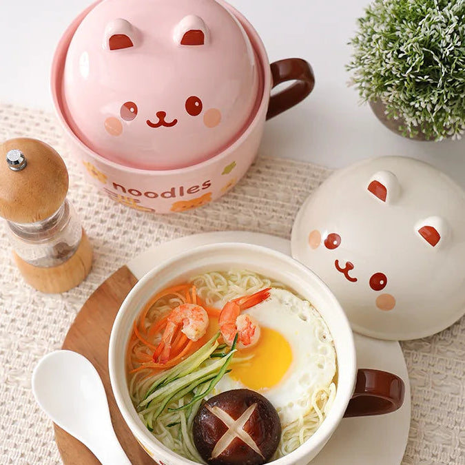 Noodle kawaii ramen bowl with cute animal-shaped containers on a white background