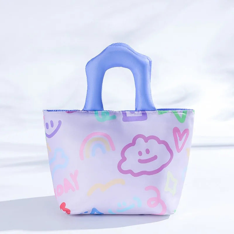 Colorful kawaii bag with smiley faces, hearts, and rainbows on a light background