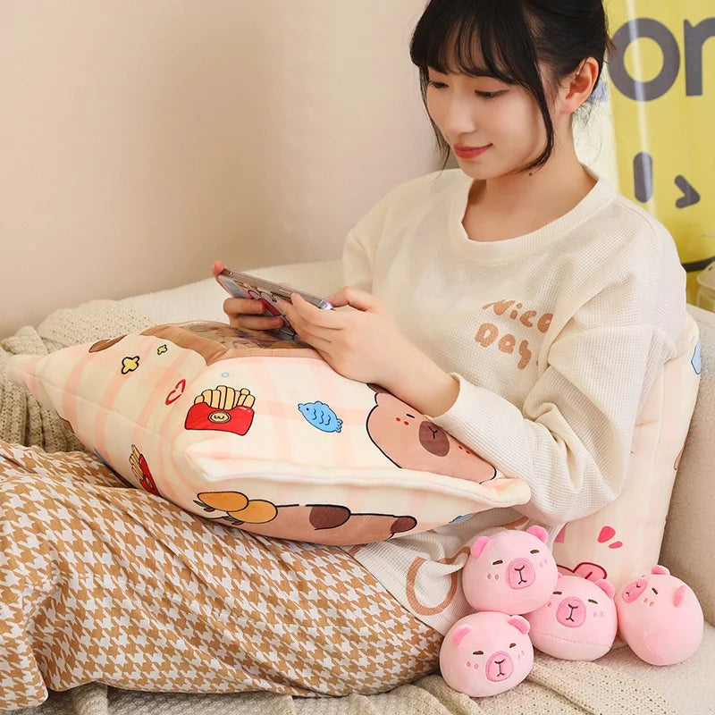 Person sitting on a couch with a cartoon kawaii pillow and plush toys