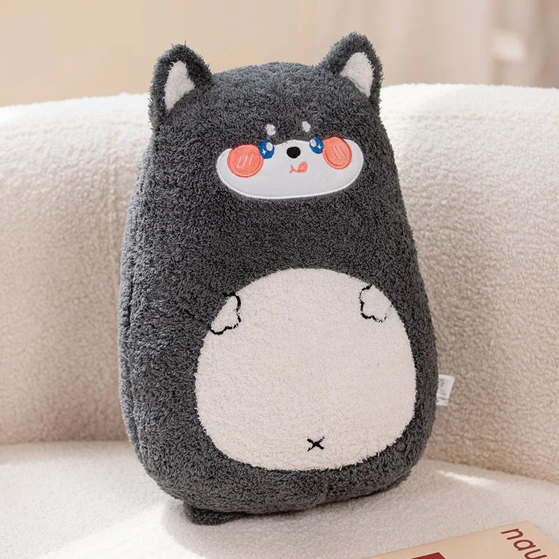 Kawaii plush toy with a cartoon face on a beige couch