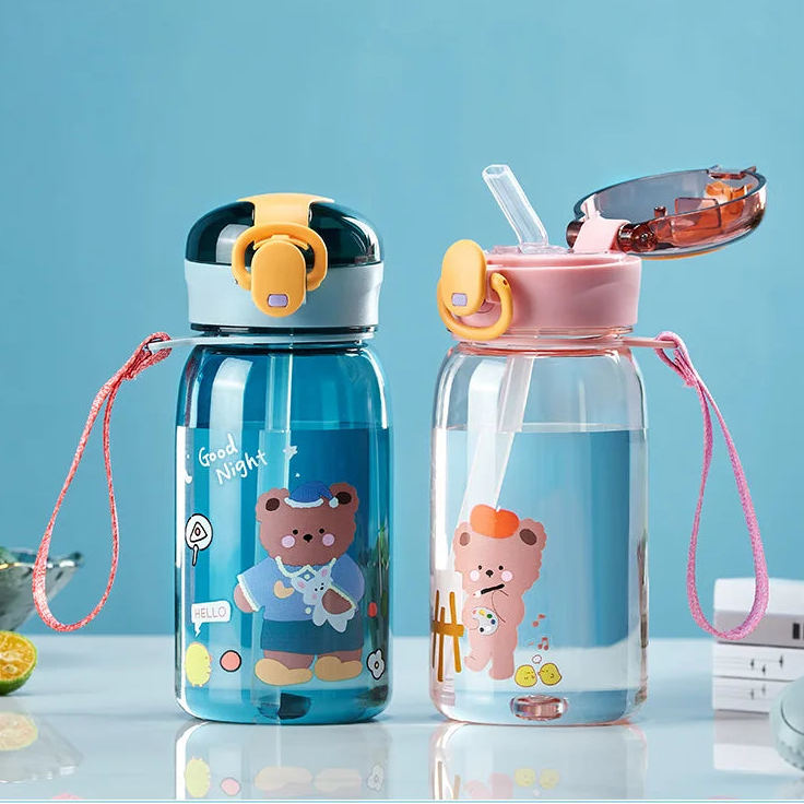 Two bear-themed kawaii water bottles with colorful designs on a light blue background, featuring the brand 'Joy Trip'.