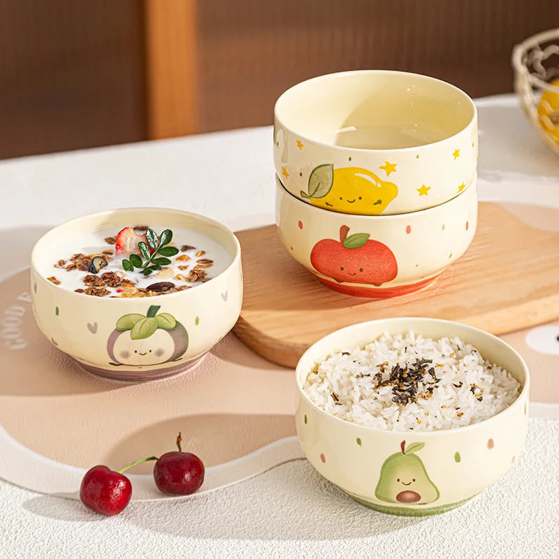 Four kawaii bowls sitting on a table