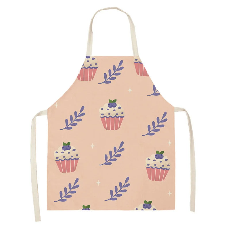 Children's kawaii apron with cupcake and leaf pattern on a pink background