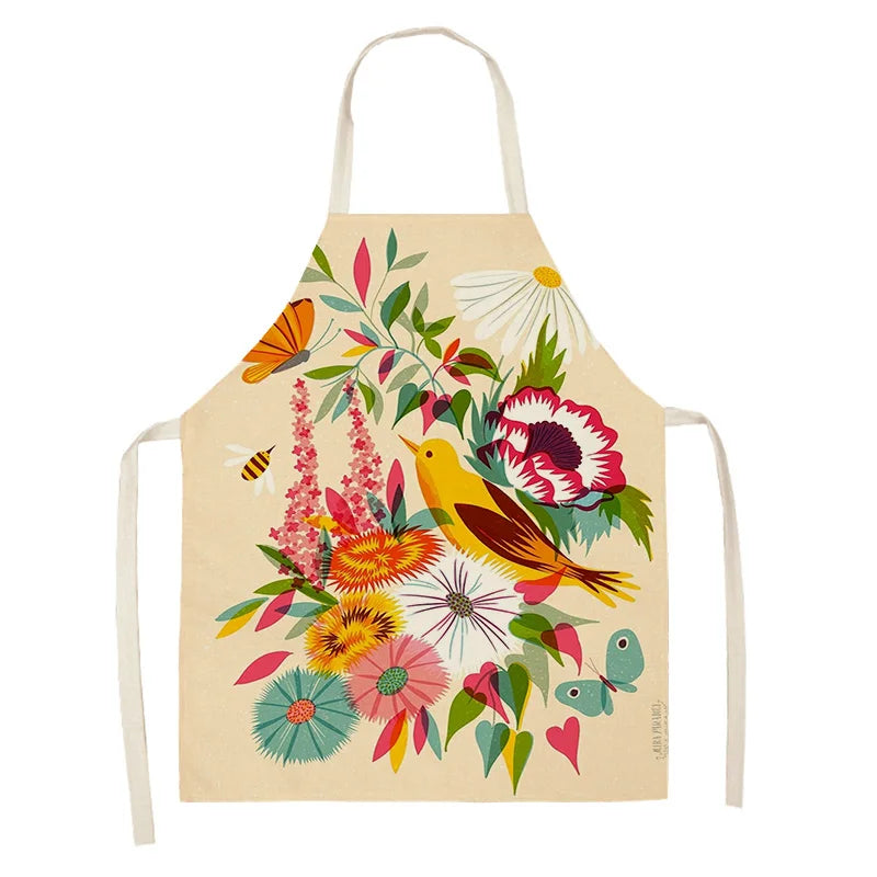 Colorful kawaii apron with floral and bird design on a white background