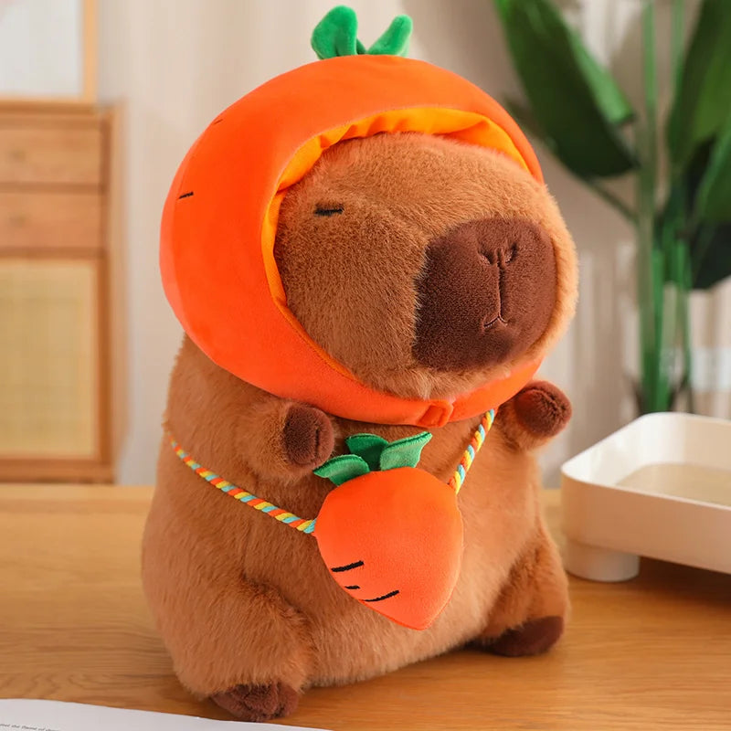 Kawaii plush toy bear wearing a carrot costume on a wooden surface with a plant in the background