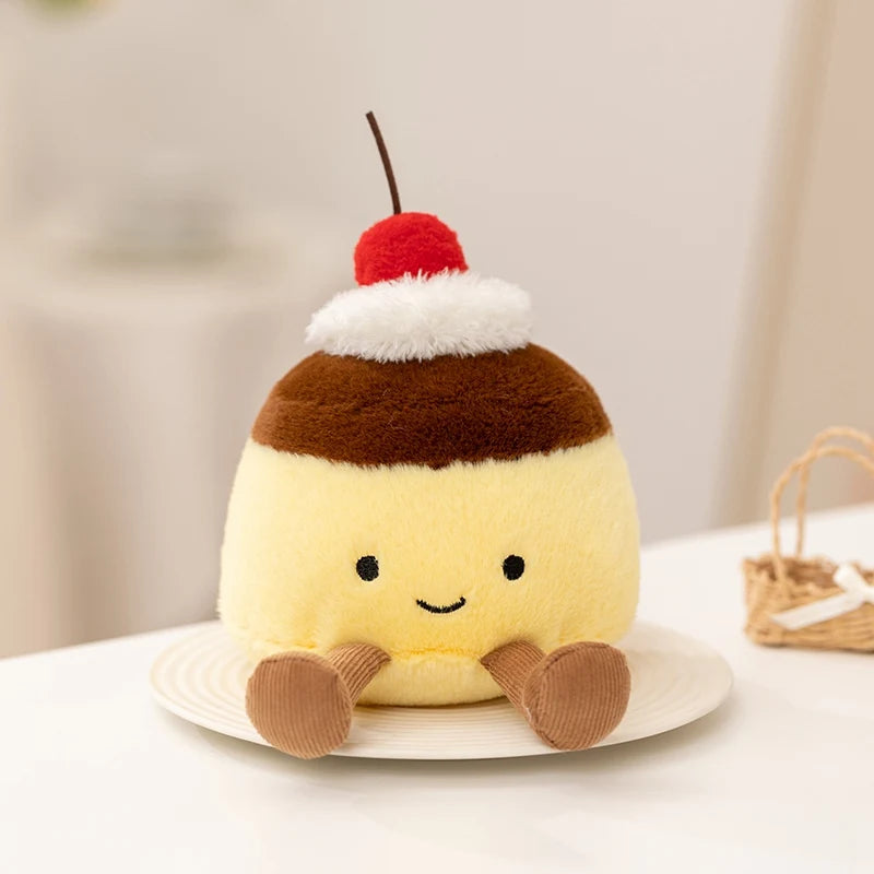 Kawaii plush toy resembling a dessert with a cherry on top on a white surface.