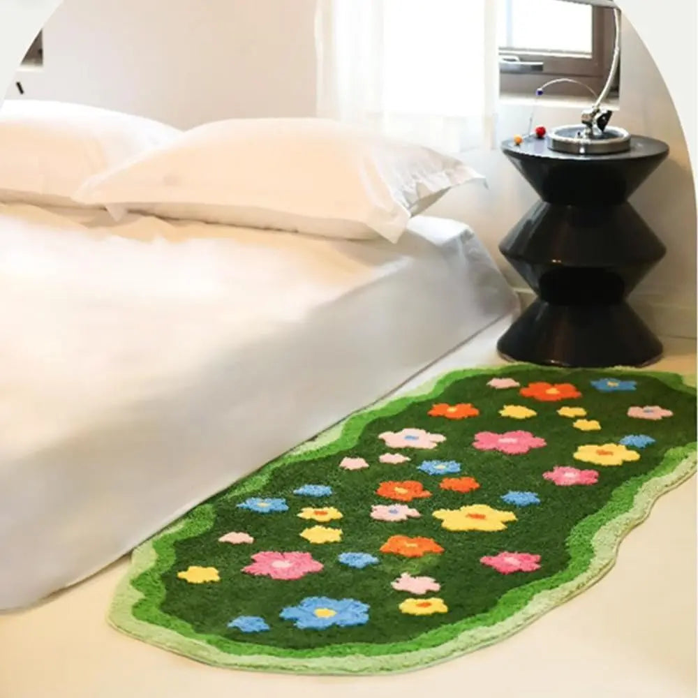 Floral-patterned kawaii rug on a bed with a black side table in the background
