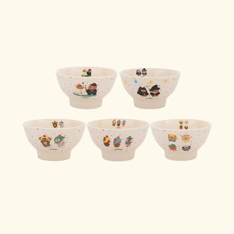 Set of five 5-inch high-foot kawaii ramen bowls with cartoon bear designs on a brown background.