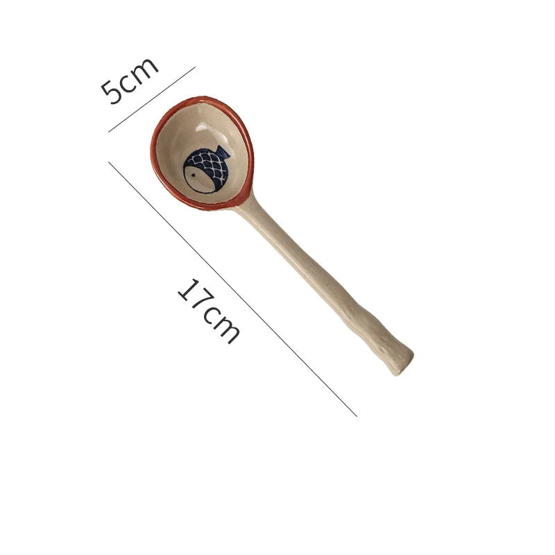 A fish designed kawaii spoon on a white background
