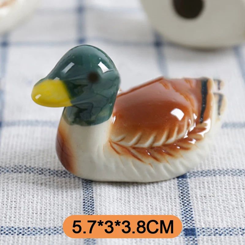 Close up of a duck shaped kawaii chopsticks holder