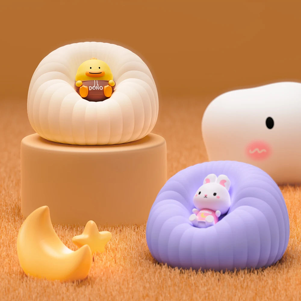 Two kawaii toys in bean bag chairs on a brown background