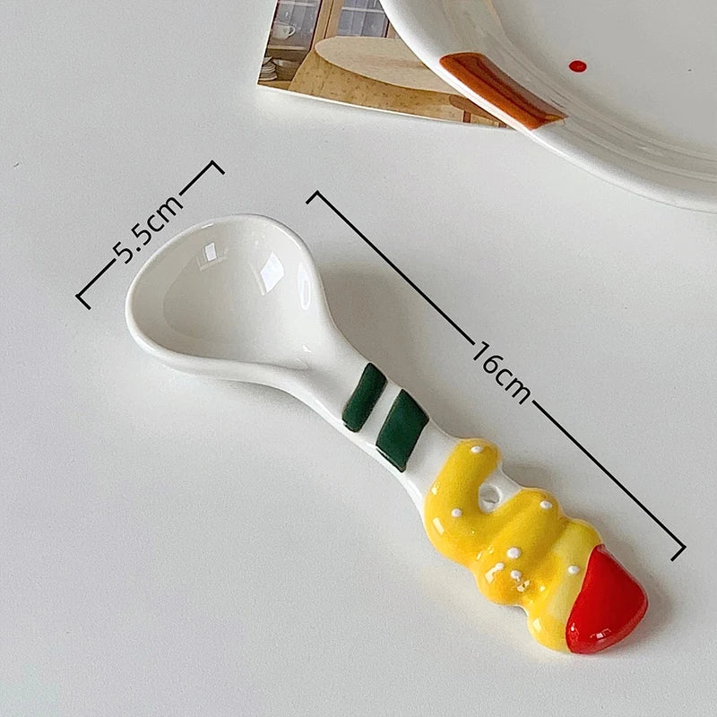 A white ceramic kawaii spoon on a table