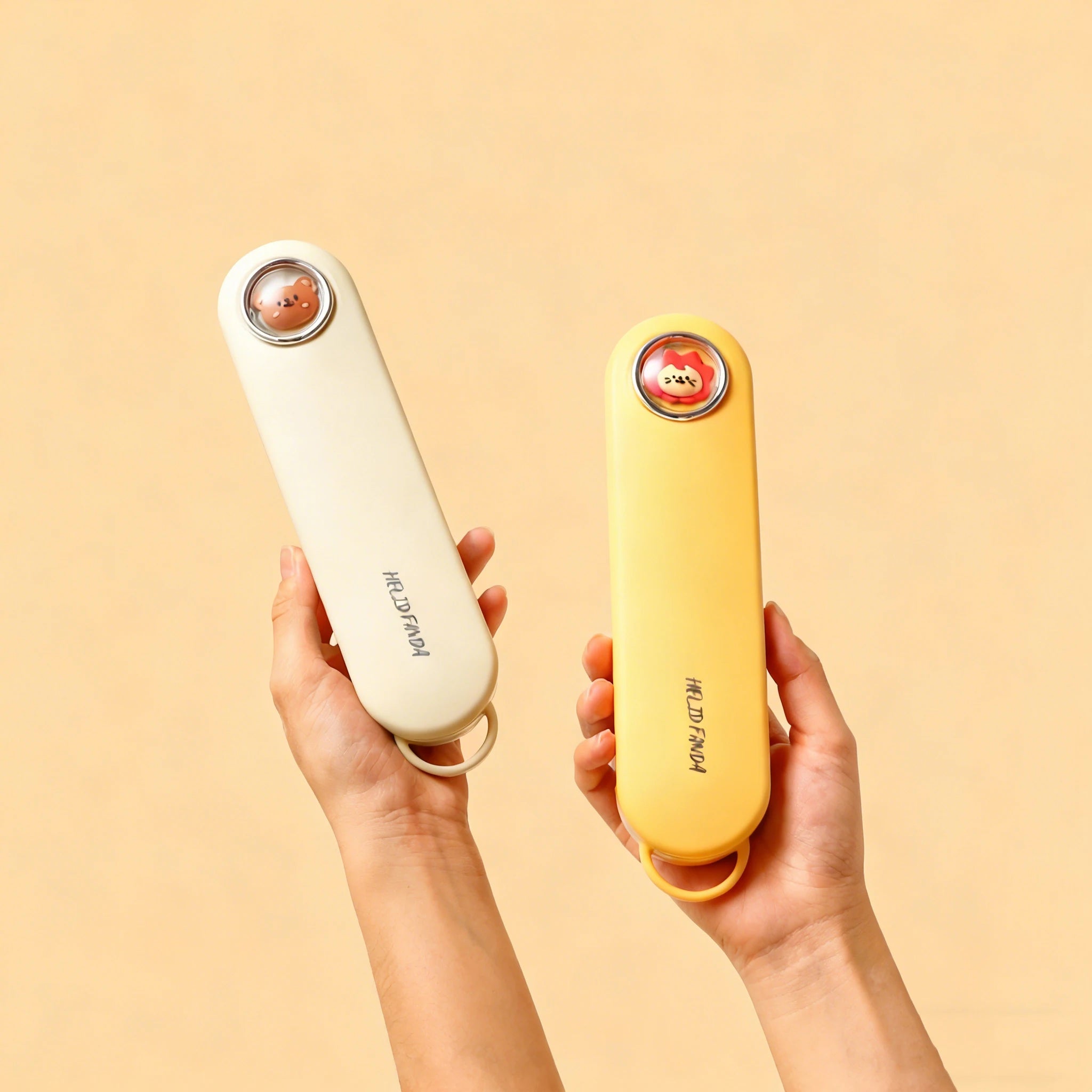 Someone holding up white and yellow kawaii utensils