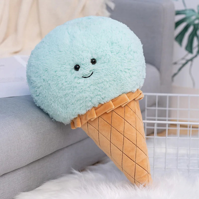 Kawaii plush ice cream cone toy with a smiling face on a couch