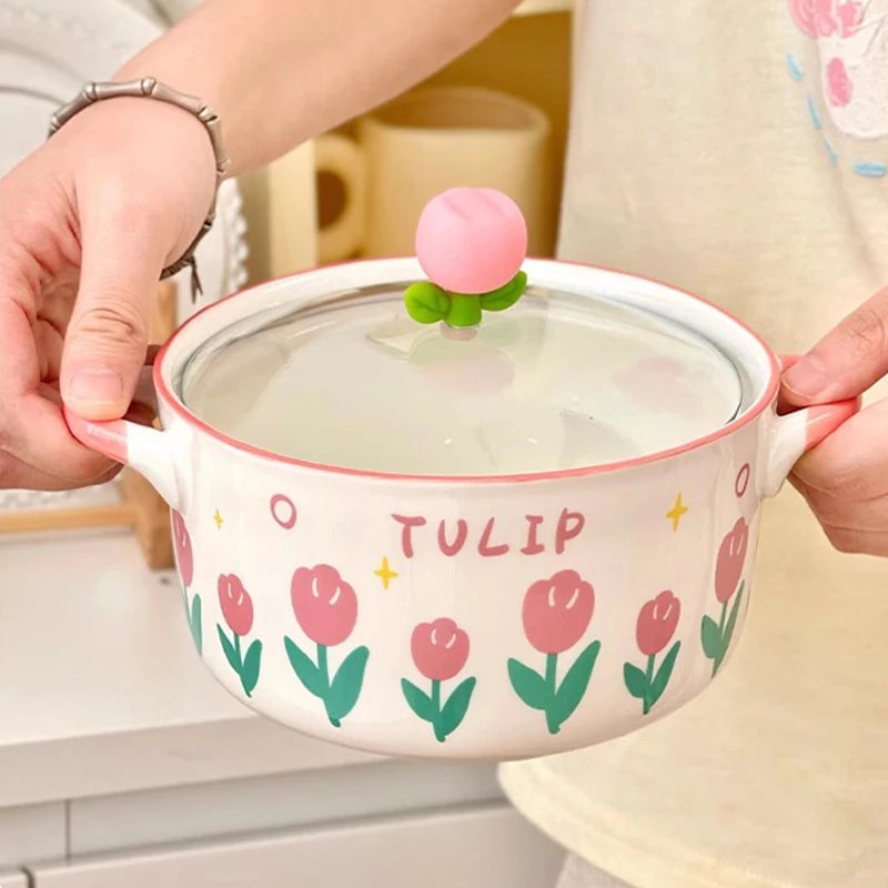 Someone holding a two handed tulip designed kawaii ramen bowl