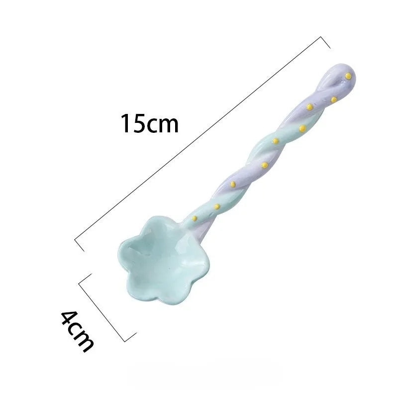 A purple and blue kawaii spoon on a white background