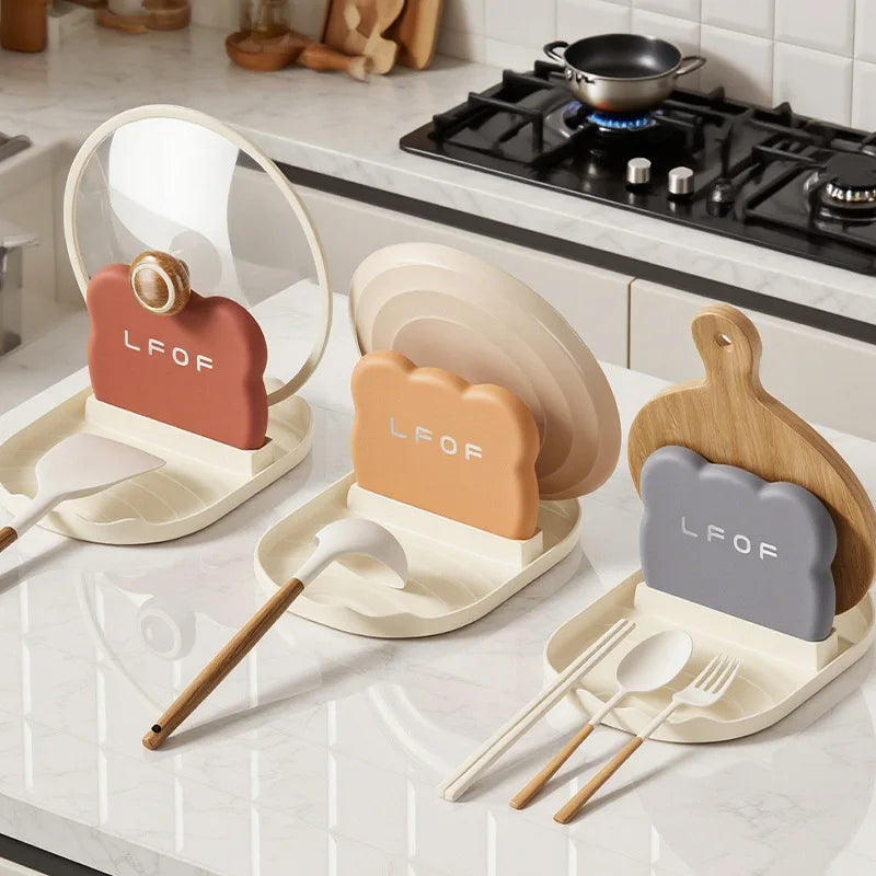 Set of kawaii kitchen utensils and cutlery on a kitchen counter