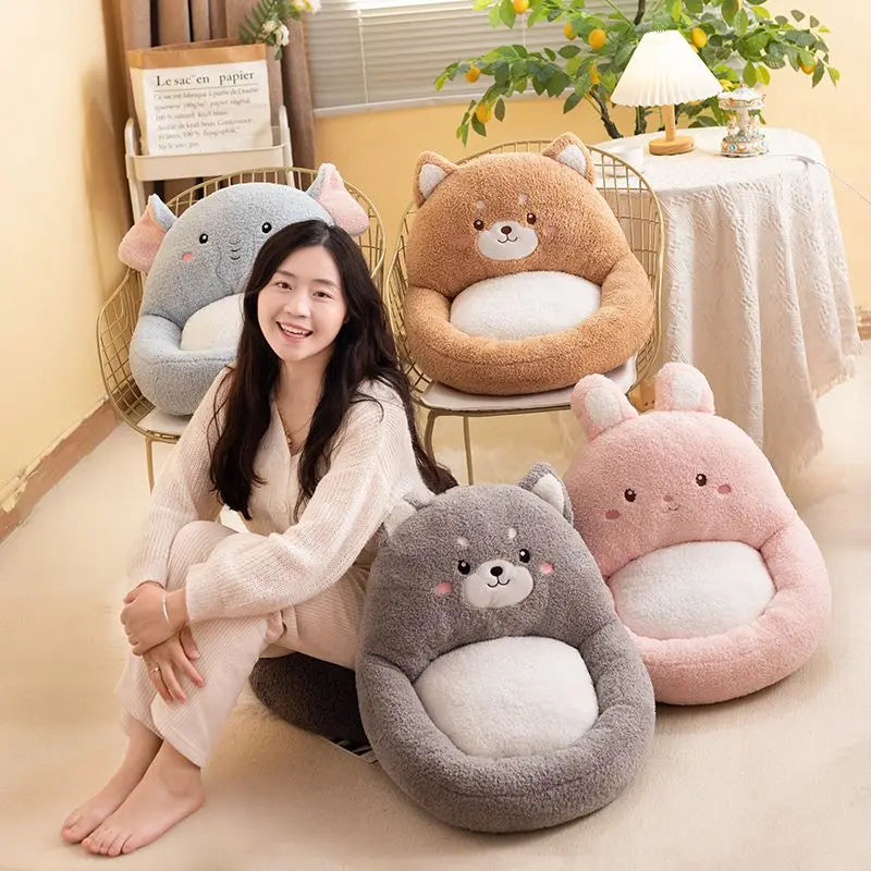Woman sitting on a chair with animal-shaped kawaii cushions in a cozy room.