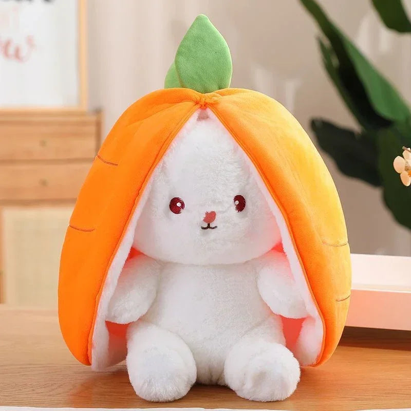 Plush kawaii toy shaped like a rabbit in an orange pumpkin costume on a wooden surface.