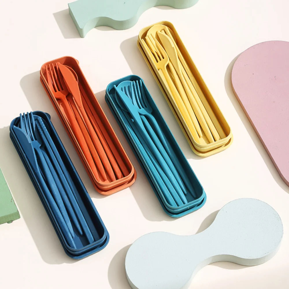 Set of colorful portable kawaii utensils sets on a light background