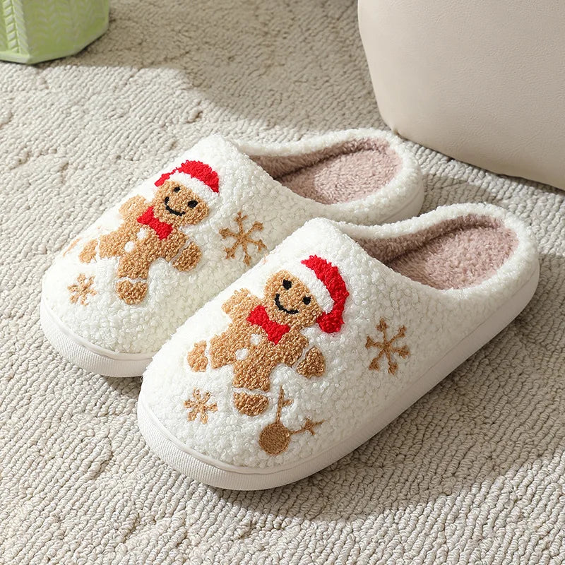Pair of white kawaii slippers with gingerbread man design on a textured surface