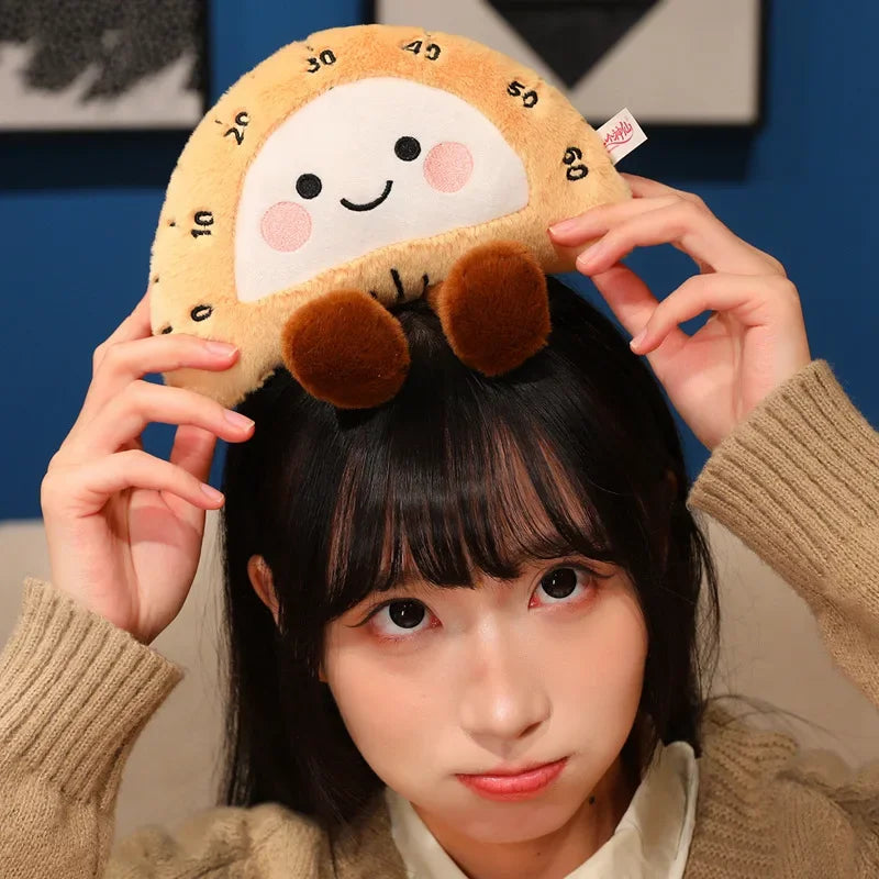 Person wearing a kawaii plush toy on their head with a blue background