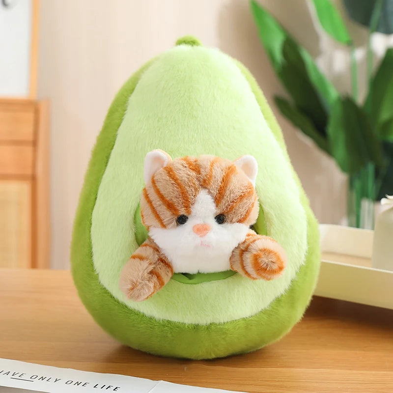 Kawaii plush toy cat inside a green avocado on a wooden surface with a plant in the background