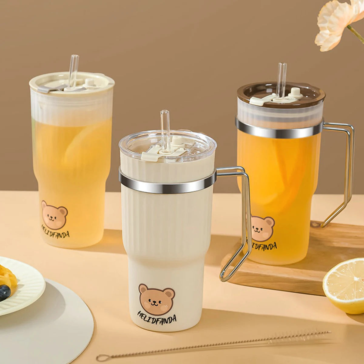 Three kawaii water cup with bear designs on a wooden surface.