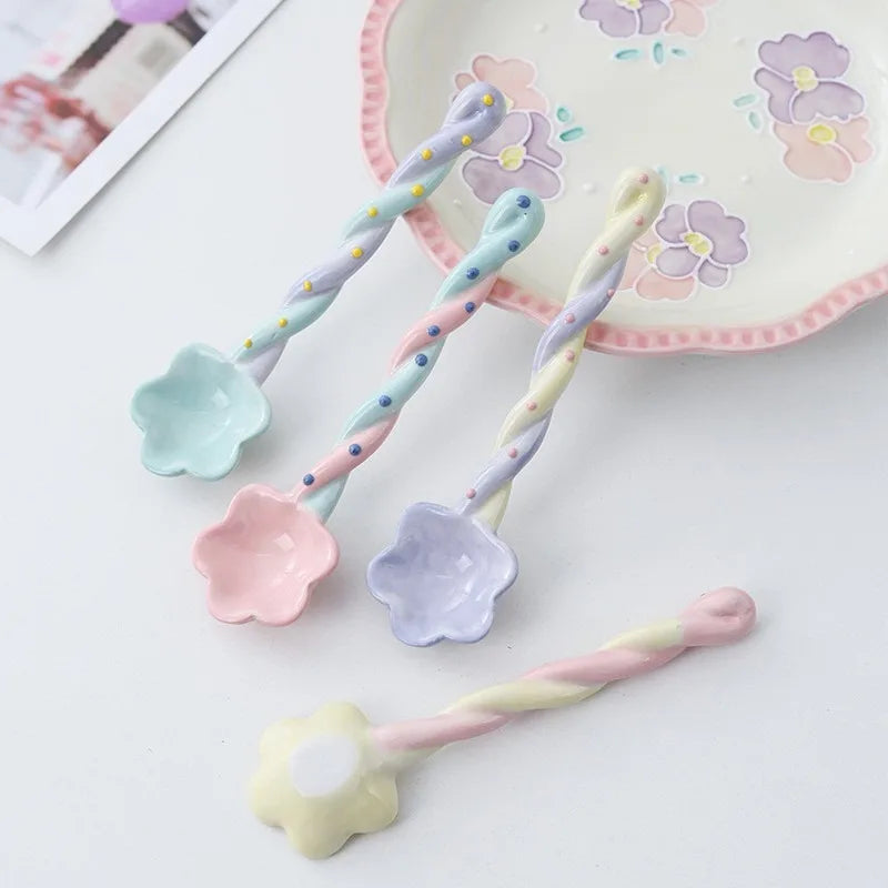 A rainbow designed kawaii spoons on a table
