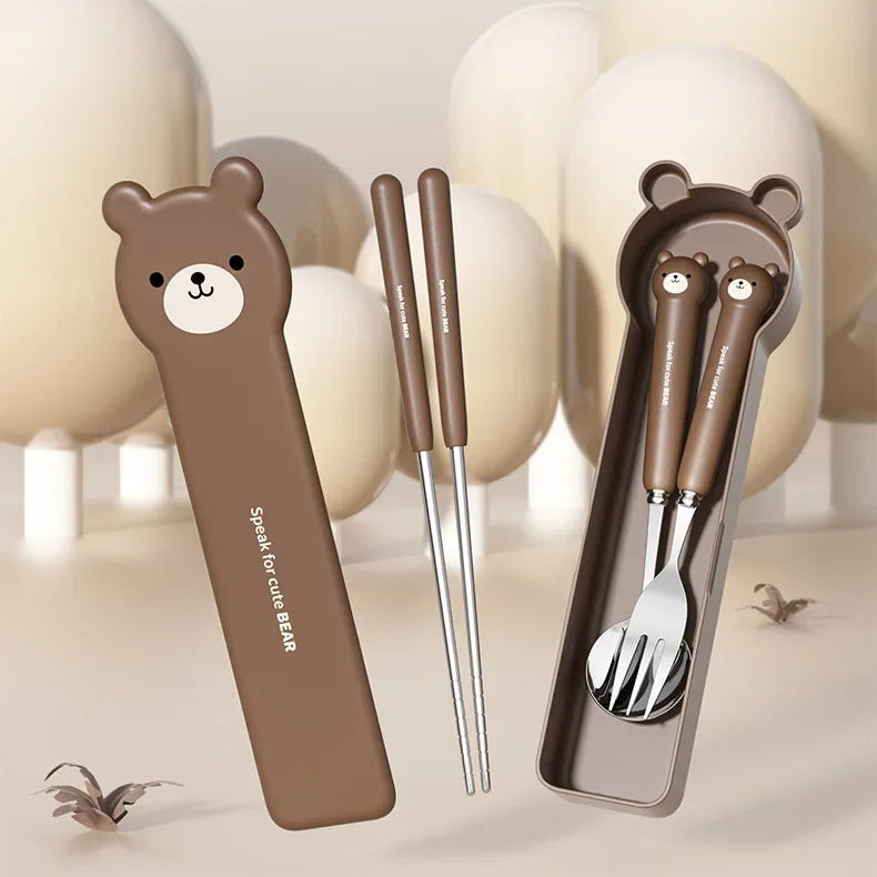 Set of kawaii utensils with bear handles in a brown case on a neutral background
