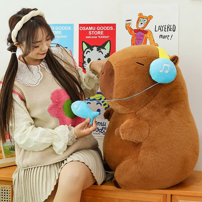 Woman interacting with a capybara plush toy in a store setting