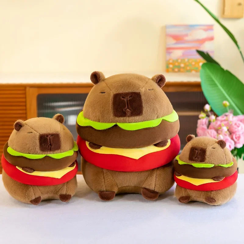 Three brown kawaii bear-shaped hamburgers with green, yellow, and red details on a light background.