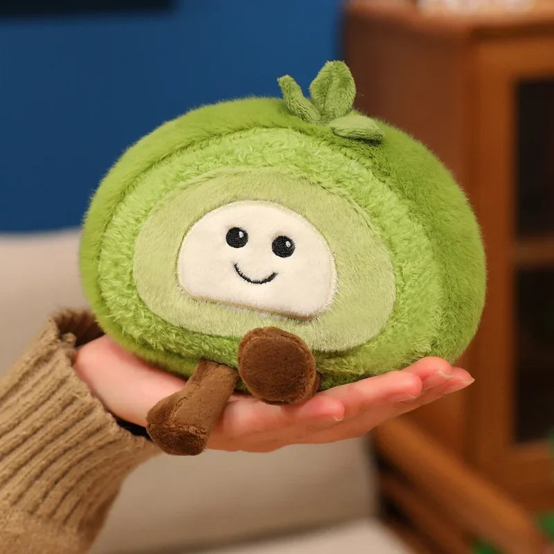 Kawaii plush toy avocado held in a hand with a blurred background