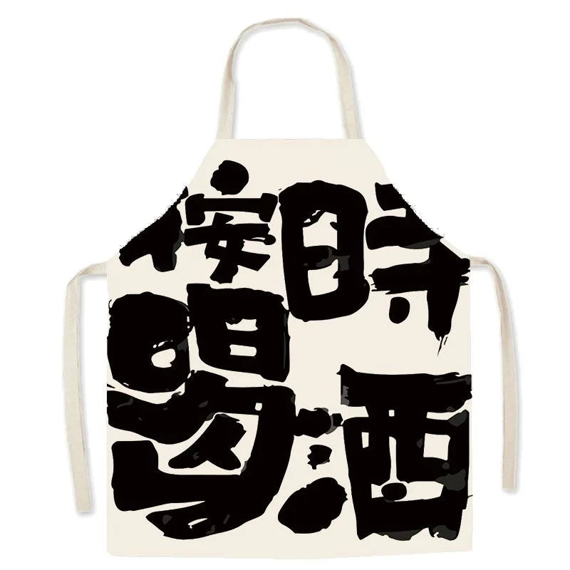 White kawaii apron with black abstract designs on a white background
