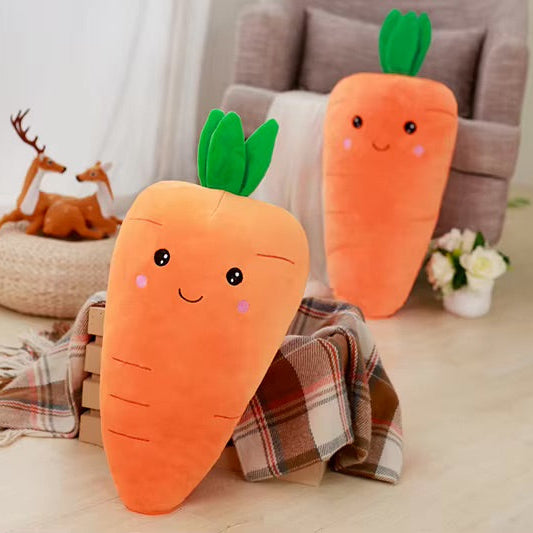 Two kawaii plush carrot toys with faces on a light-colored floor.