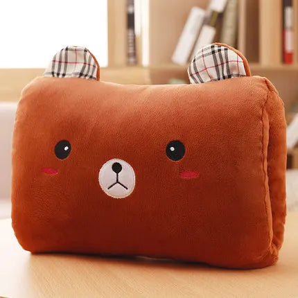 Plush pillow with a bear face kawaii design on a wooden surface