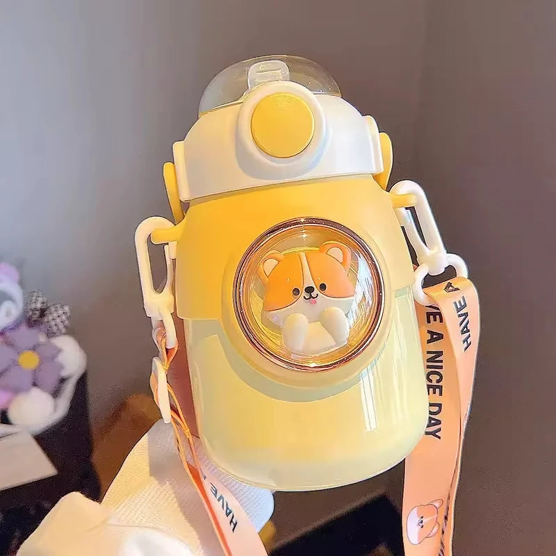 Yellow kawaii water bottle with a cute design and pink strap in a neutral setting