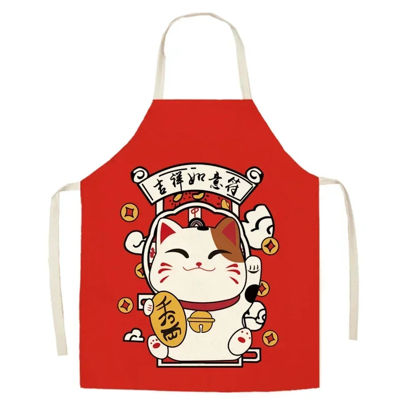 Red kawaii apron with a cartoon cat design on a white background
