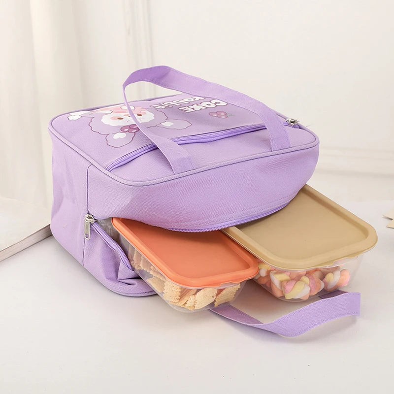Purple kawaii lunch bag with compartments on a light background
