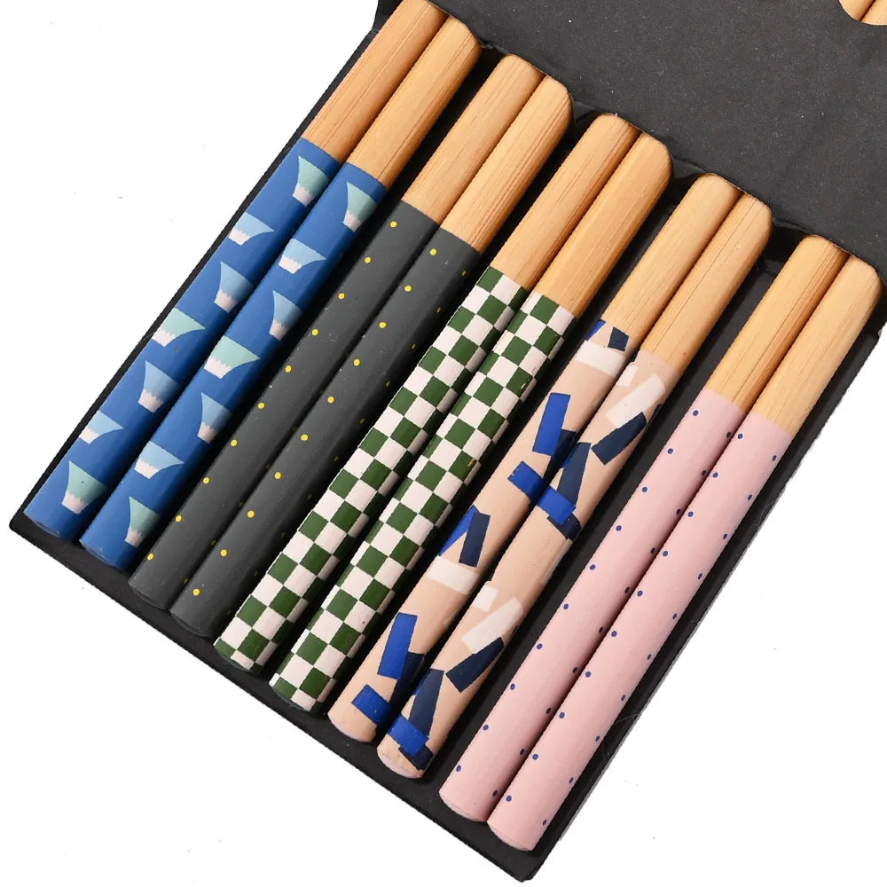 Set of patterned wooden kawaii chopsticks in a black case