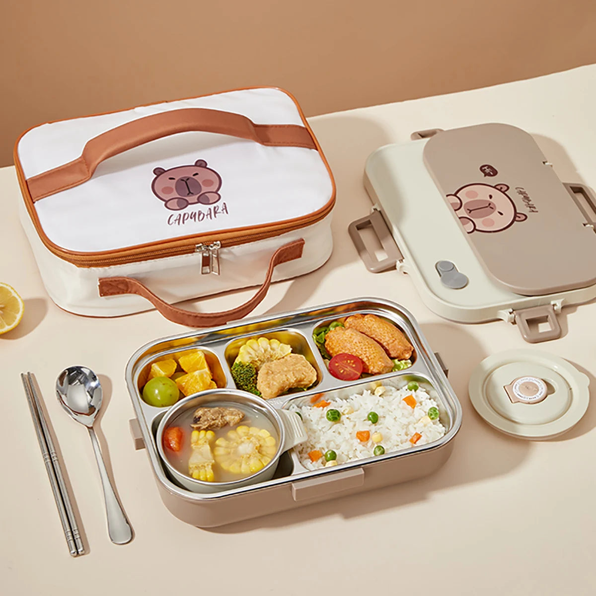 Lunch box set with bento box, container, and kawaii pink bear design on a beige background