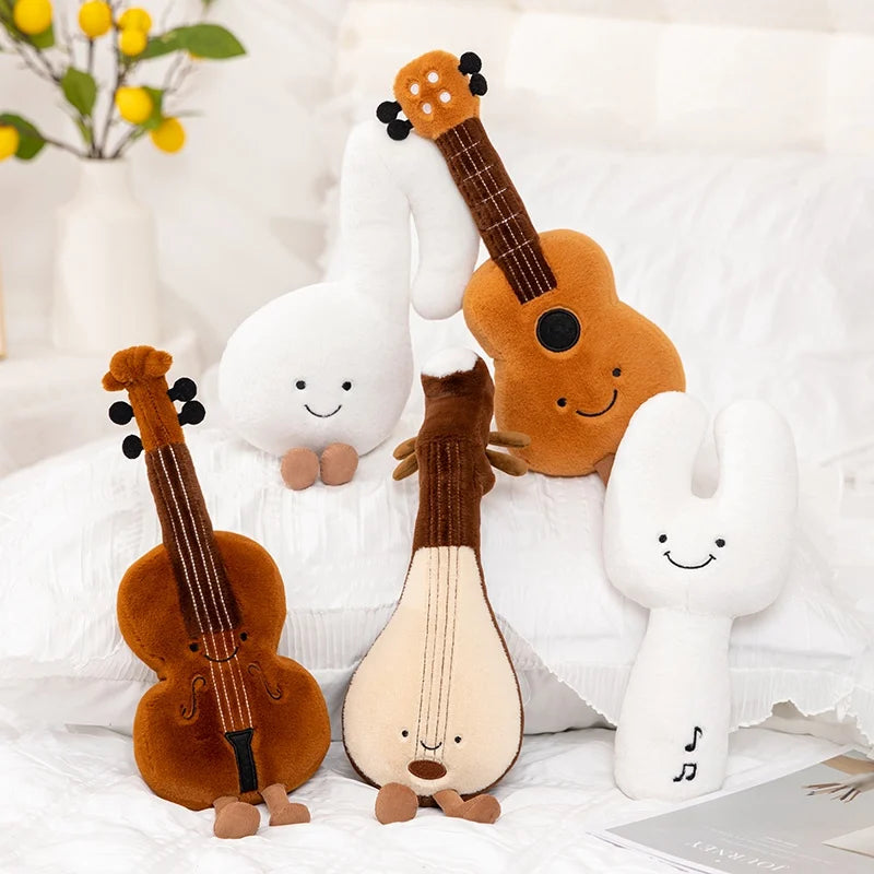 Kawaii plush toys shaped like musical instruments and characters on a white background