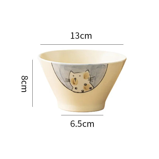 Ceramic kawaii ramen bowl with cat design and measurements on a white background