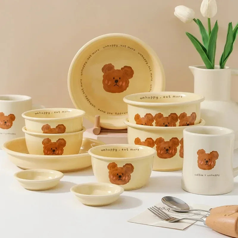 Ceramic kawaii tableware set with bear designs on a light background